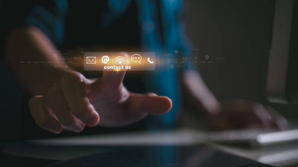 istock Contact us or Customer support hotline people connect. Businessman pointing virtual screen contact icons  email, address, live chat, internet wifi 2151274124