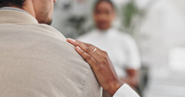 istock Support, sympathy and hand on shoulder in therapy for compassion, comfort and understanding of mental health. Closeup, people and counselling session with depression, stress and kindness with advice 2151279127