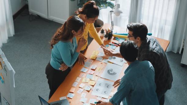 istock Top view of designer explain and brainstorming idea for logo design. Symposium. 2151281741