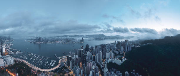 istock Hong Kong harbour crowded skyscraper cityscape from hillside China 2151288352