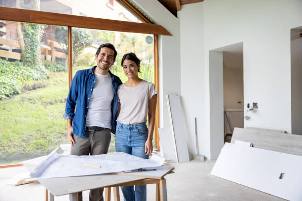 istock Loving couple remodeling their house and smiling 2151288729