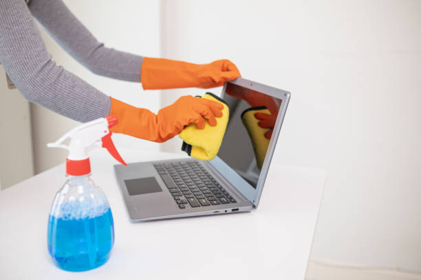 istock The disinfectant-based cleaning solution is prepared in a spray bottle for easy spraying to clean office interiors and furniture surfaces. Concept of contract Hire a cleaner and spraying disinfectant 2151292764
