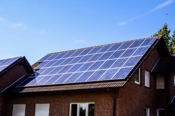 istock A house with a solar panel on the roof 2151293928