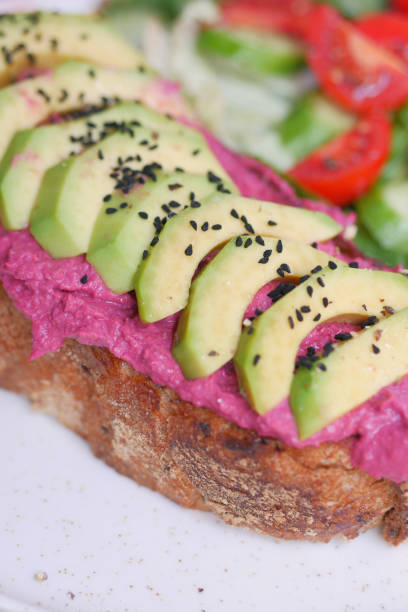 istock sandwich with avocado and hummus on plate 2151295510