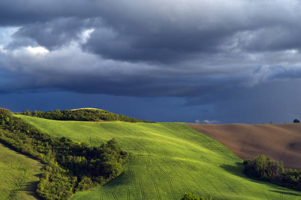 golden hour on the Montefeltro  hills against the cloudy sky