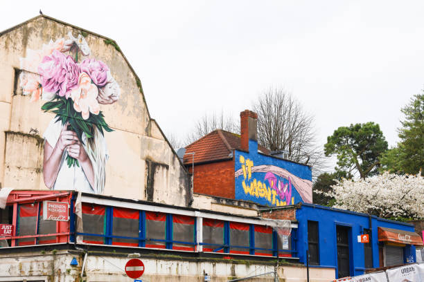 Bristol, England- March 30, 2024: Colorful graffiti's on the wall in Bristol city