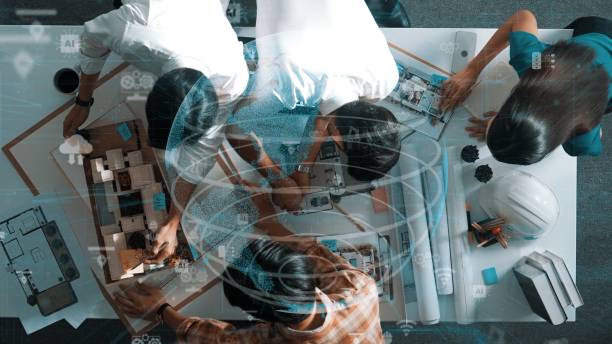 istock Top view of smart engineer team working together and present idea. Alimentation. 2151297475