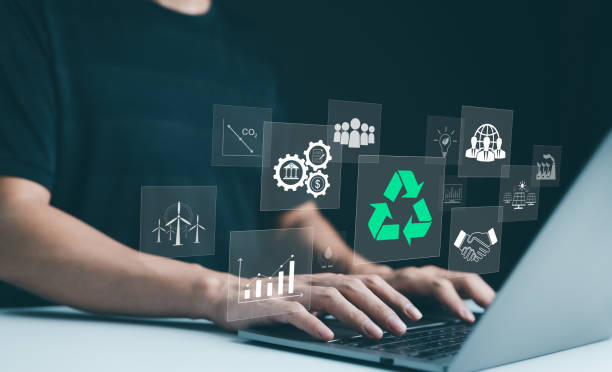 istock Sustainable development planning concept. Person using a laptop with virtual icons related to recycling, renewable energy, and environmental protection. ESG business sustainability investment strategy 2151299396