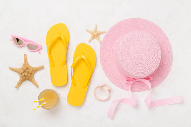 istock Flat lay with colorful beach accessories on concrete background. Vacation concept 2151299595