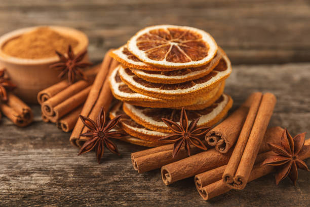 istock Cinnamon sticks and anise on a textured background. Cinnamon roll and star anise. Spicy spice for baking, desserts and drinks. Fragrant ground cinnamon.Place for text. copy space. 2151301127