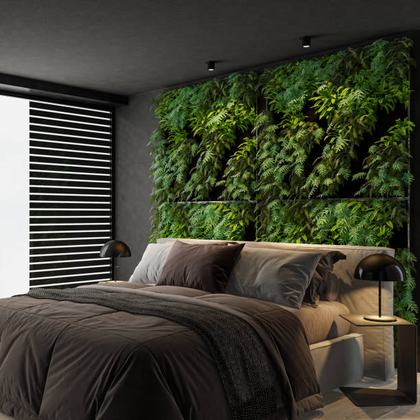 istock Modern dark interior bedroom with green foliage wall 2151303231
