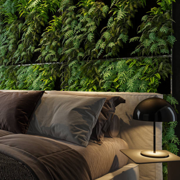istock Modern dark interior bedroom with green foliage wall 2151303236