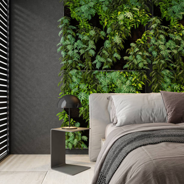 istock Modern dark interior bedroom with green foliage wall 2151303250