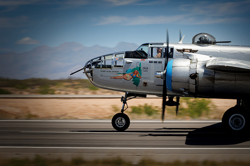 Santa Teresa, New Mexico, USA - April 28, 2024: A B-25 Mitchell bomber, named Maid in the Shade, lands at the airport.
