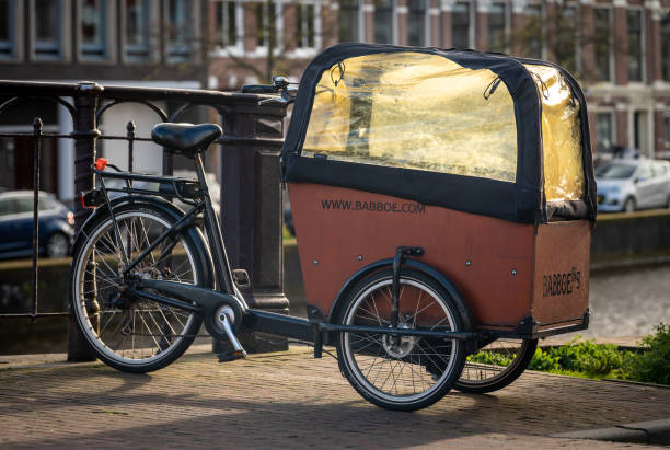 Haarlem, The Netherlands, 20.04.2024, Typical dutch cargo bike with children box The Babboe Big