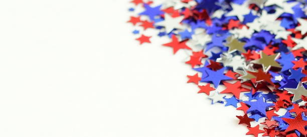 istock 4th of July USA Independence Day decorations stars and flags confetti pattern frame isolated  on white background.Banner 2151308589