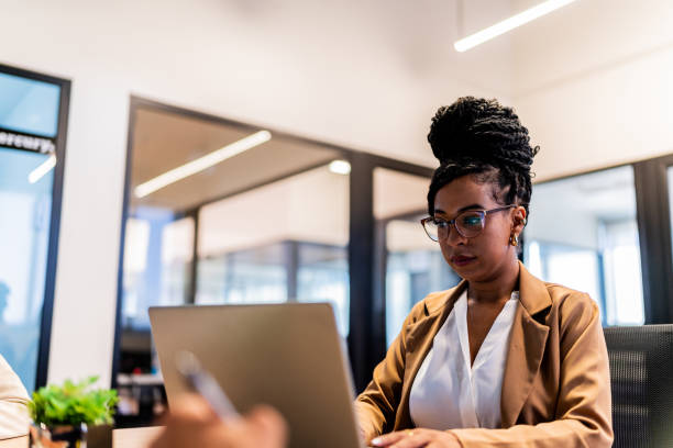 istock Businesswoman working and using laptop at office 2151309496