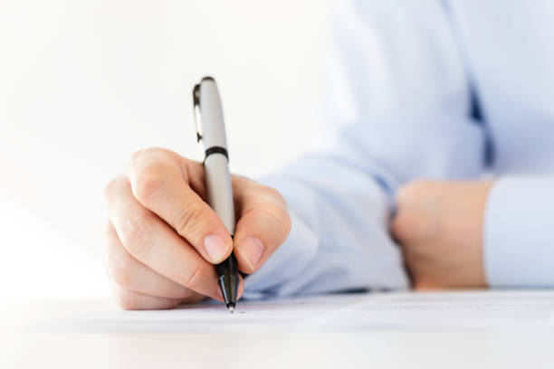 istock Woman Signing Contract Paper 2151310030