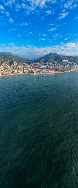 Experience the captivating blend of sun, sea, and sand in this breathtaking drone panorama captured over Puerto Vallarta, Mexico, in February 2024.