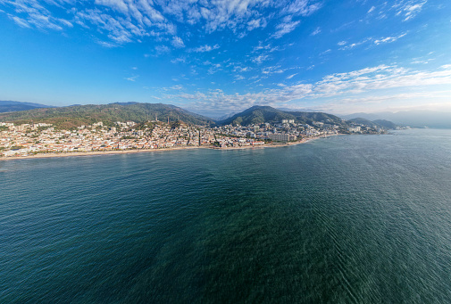 Experience the captivating blend of sun, sea, and sand in this breathtaking drone panorama captured over Puerto Vallarta, Mexico, in February 2024.