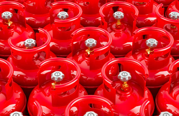 istock Background from red propane cylinders with compressed gas, top view. 3D rendering 2151310408