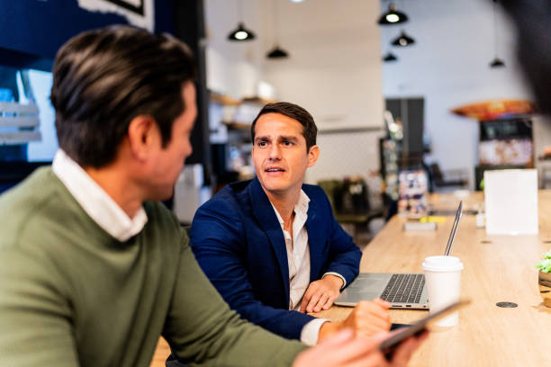 istock Businessmen talking in a meeting at office 2151310486