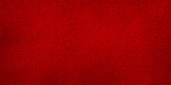 Suede macro photo thin focal part. Red suede web size background.