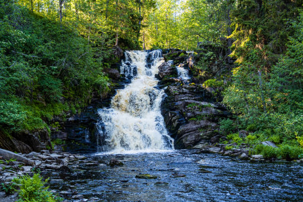 istock beautiful picturesque strong bubbling waterfall 2151312057