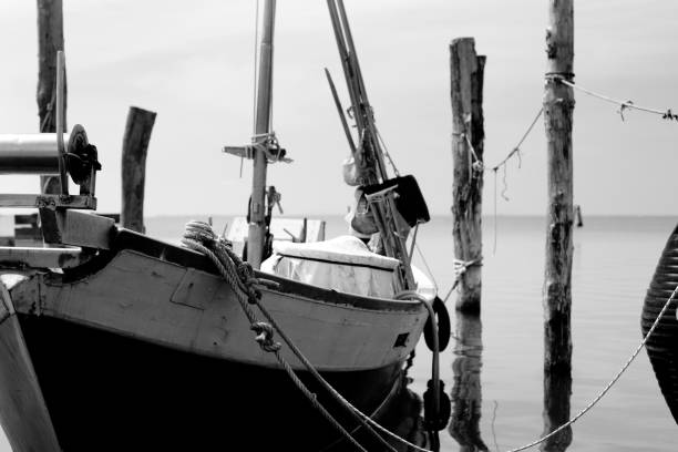 Aerial view, fishing boat with artisanal fishermen near the shore