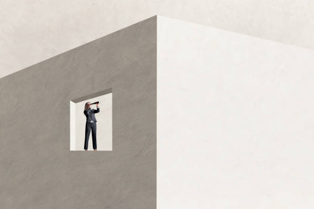 istock Woman Looking Through Spyglass 2151321919