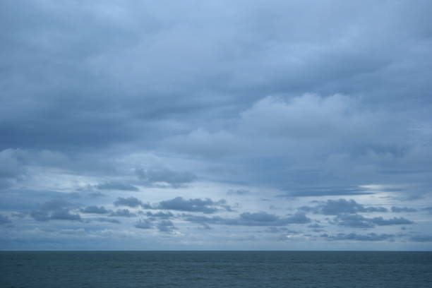 Stormy sky over the sea in the evening. Clouds over the sea be used as a background.