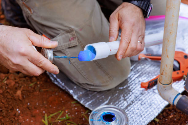 istock An experienced plumber seals pvc plastic pipes with glue before gluing them a together 2151323495