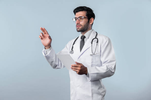 istock Caucasian smart doctor pointing while standing and wearing lab coat. Deviation. 2151326739