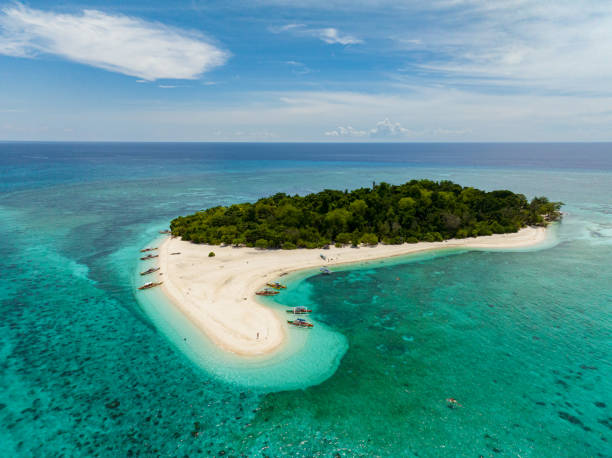 Tropical Island in Camiguin, Philippines. Mantigue Island.