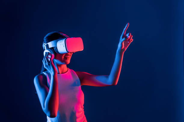istock Elegant female connect metaverse use finger point virtual object. Hallucination. 2151331646