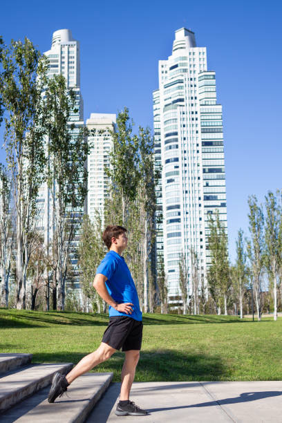 istock Young man stretching in the city 2151337710