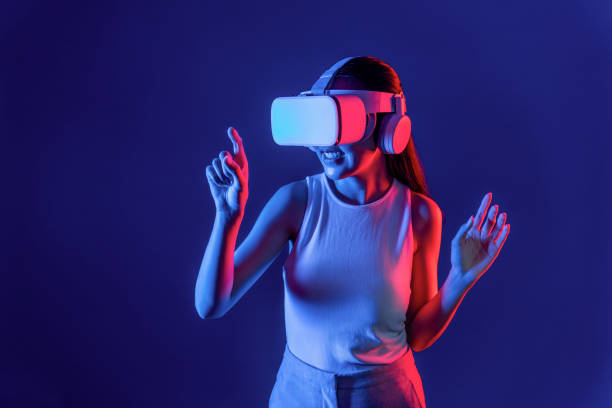 istock Elegant female connect metaverse use finger point virtual object. Hallucination. 2151342975