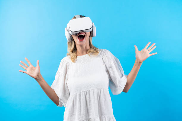 istock Smart girl excited with metaverse by using VR goggle at background. Contraption. 2151351045