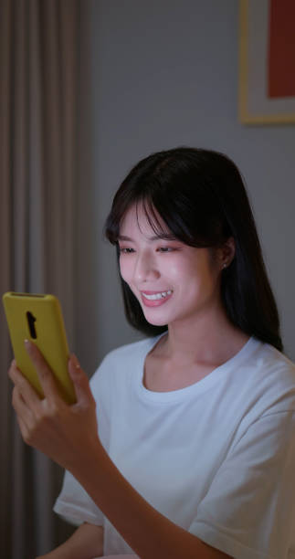 istock woman use smartphone happily 2151358489