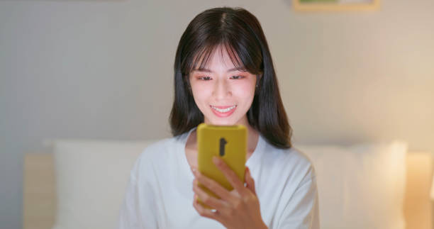 istock woman use smartphone happily 2151358523