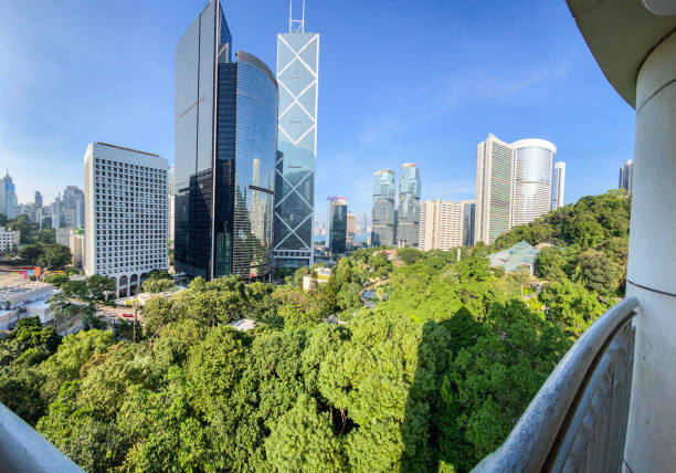 istock Urban Oasis: Green Park Amidst Soaring Skyscrapers, Hong Kong 2151358529