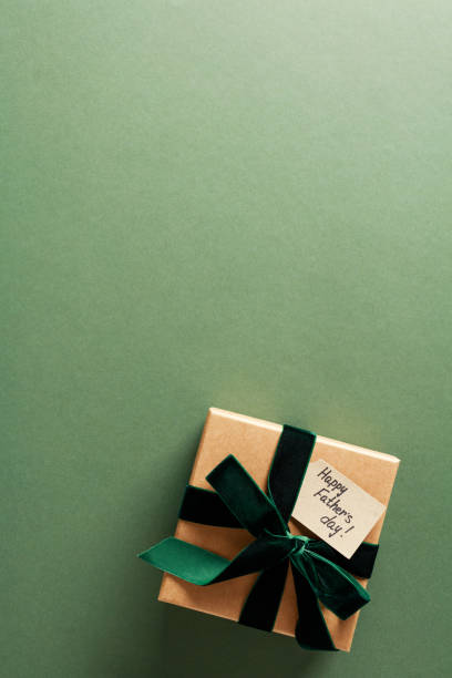 istock Happy Fathers Day concept. Flatlay composition with gift box on dark green background. 2151368895