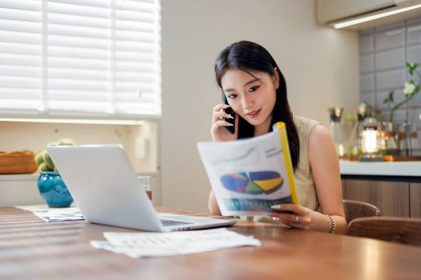 istock One Young  China women working on laptops at home 2151369649