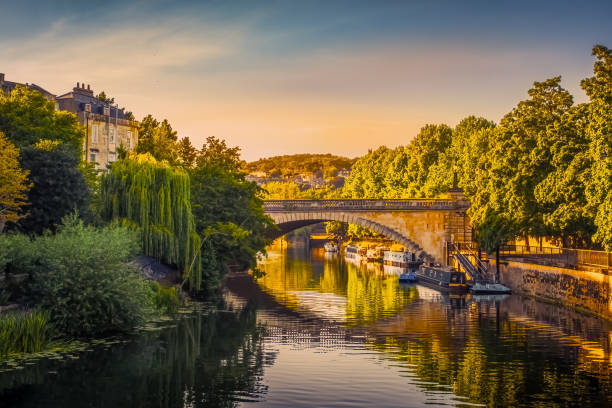 View of Avon River and bridge over it in Bath, England