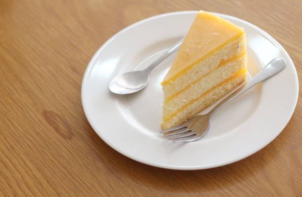 Lemon cake coated with sugar sweet icing. cake loaf.