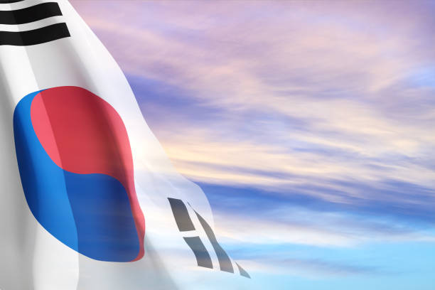 Flag of South Korea against the sunset sky