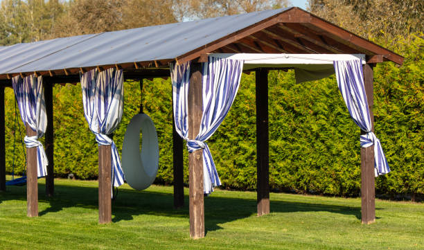 istock Gazebo on a green lawn in the park 2151378458