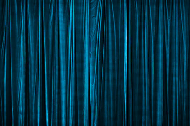 istock blue curtain in theatre. 2151380915