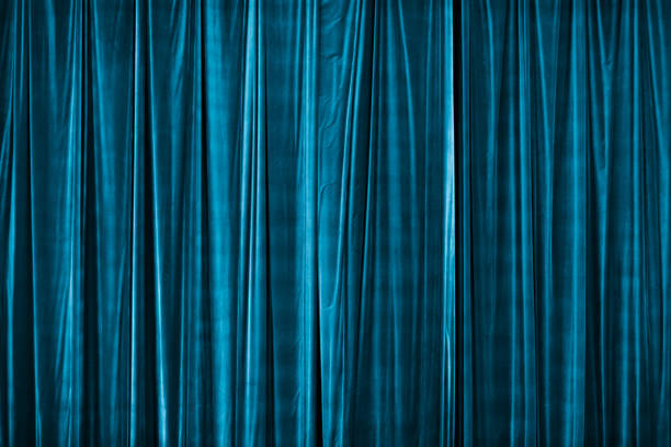 blue curtain in theatre. Textured background