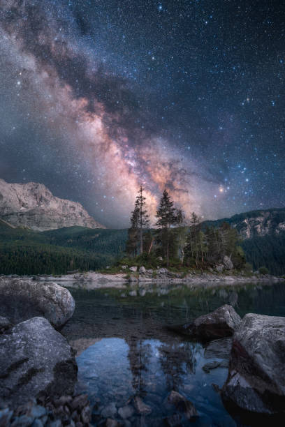 istock Night scenery with the Milky Way reflected in a lake 2151382031